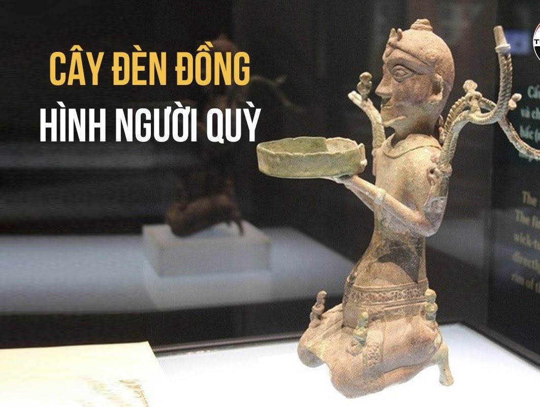 Cây đèn đồng hình người quỳ